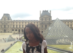 Me with the courtyard of the Louvre in the background